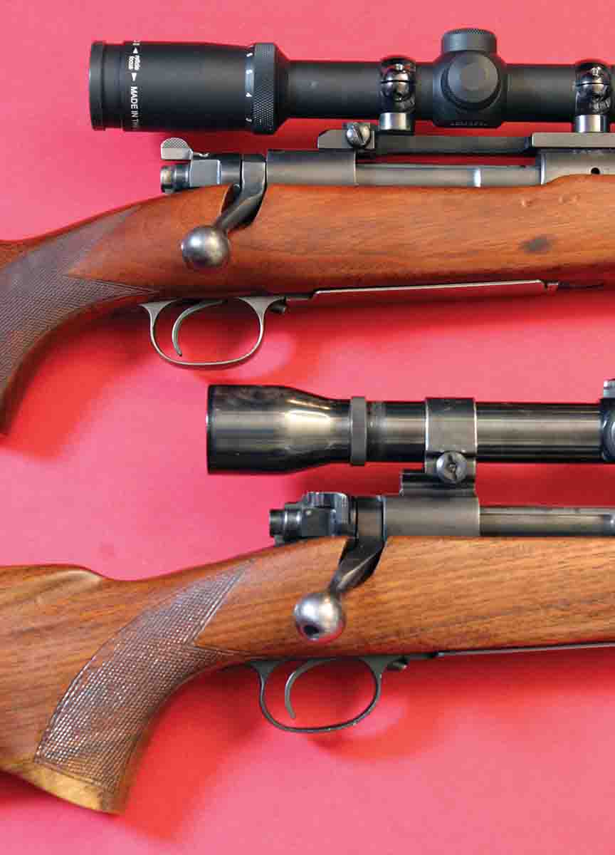 The difference in the prewar Model 70 safety (top, .257 Roberts) and the final, present design (bottom, Featherweight .308 made in 1953) plainly shows why the original did not work as well underneath low-mounted scopes.